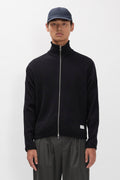 Cardigan zippé côtelé militaire – Un cardigan zippé décontracté inspiré des sous-vêtements thermiques militaires, confectionné en jersey de coton côtelé 440 g/m² – Il présente un c…