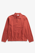 Polo en jersey de coton texturé coupe décontractée - Un polo coupe décontractée confectionné dans un jersey de coton texturé - Le modèle présente un col en maille côtelée plate, un bouton...