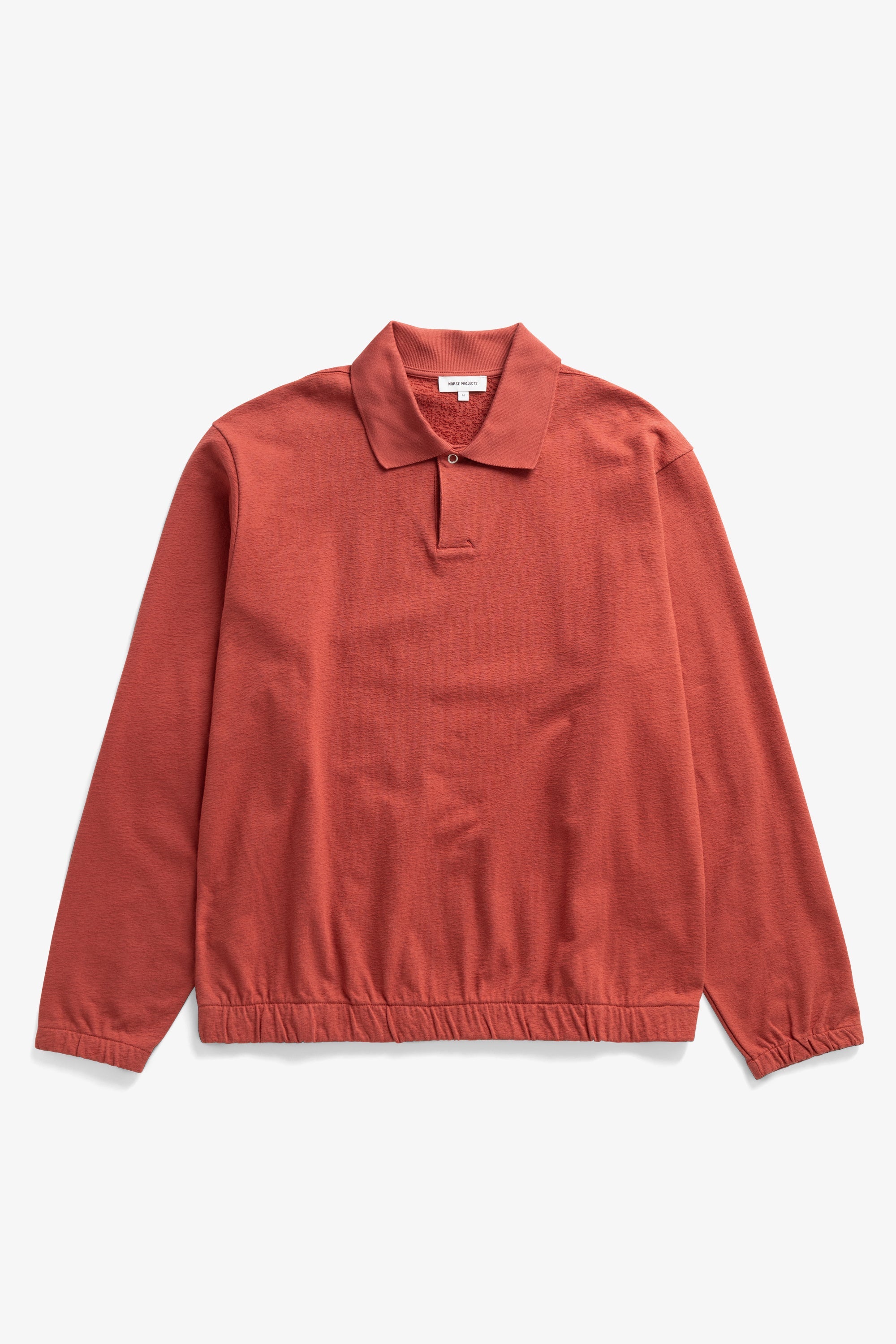Polo en jersey de coton texturé coupe décontractée - Un polo coupe décontractée confectionné dans un jersey de coton texturé - Le modèle présente un col en maille côtelée plate, un bouton...