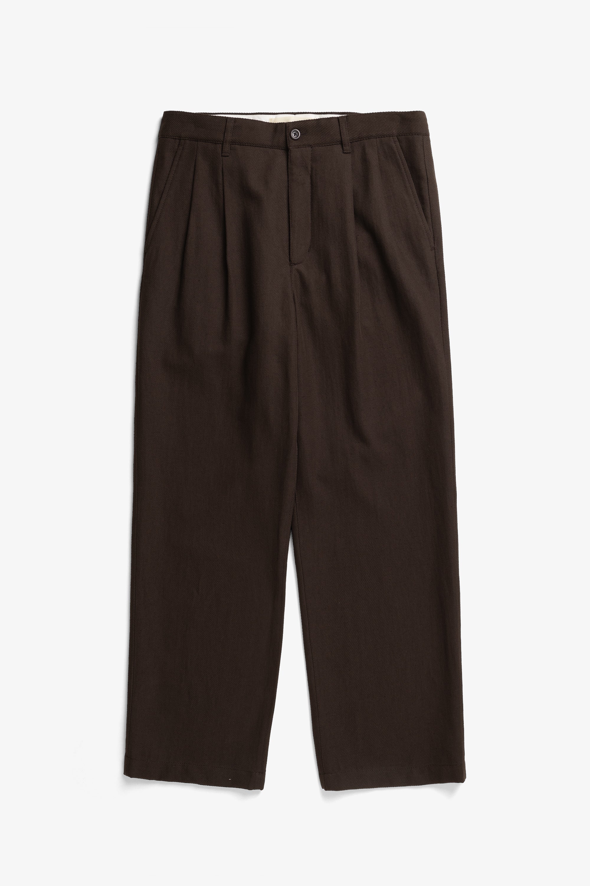 Pantalon plissé décontracté en sergé de coton et lin – Un pantalon ajusté à coupe décontractée, avec une jambe ample et des doubles plis sur le devant, confectionné à partir d'un…