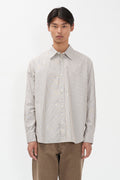 Chemise oversize en popeline de coton - Une chemise à la coupe oversize, avec un corps plus large coupée dans une popeline de coton mélangé rayée à haut compte de fils - Une coupe oversize…