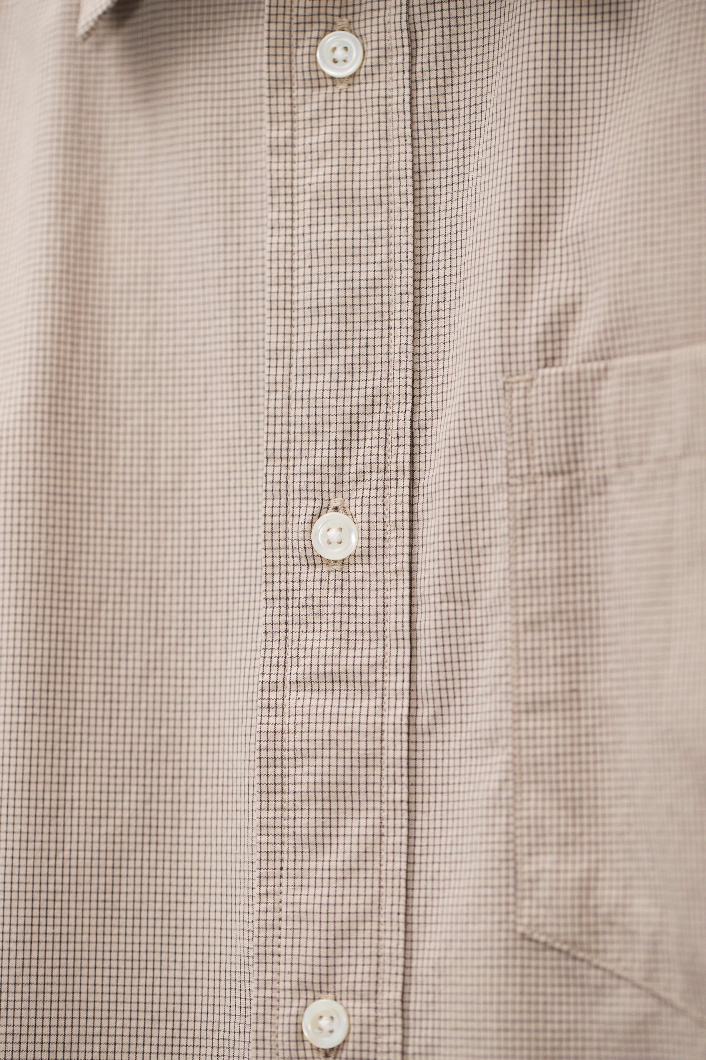 Chemise - Une chemise ample, avec un corps plus large, fabriquée en coton léger, lavée pour un toucher doux et décontracté - Cette chemi…