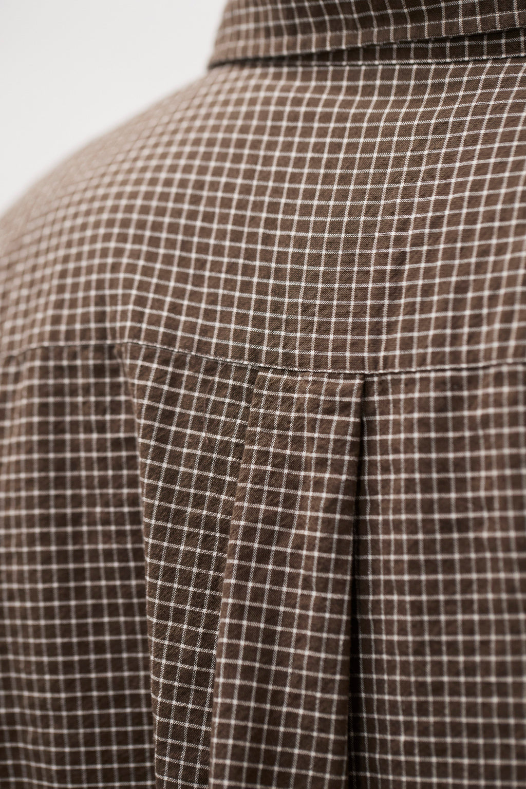 Chemise - Une chemise ajustée, avec un corps plus large, confectionnée en popeline de coton légère, lavée pour un toucher doux et décontracté - Une che…