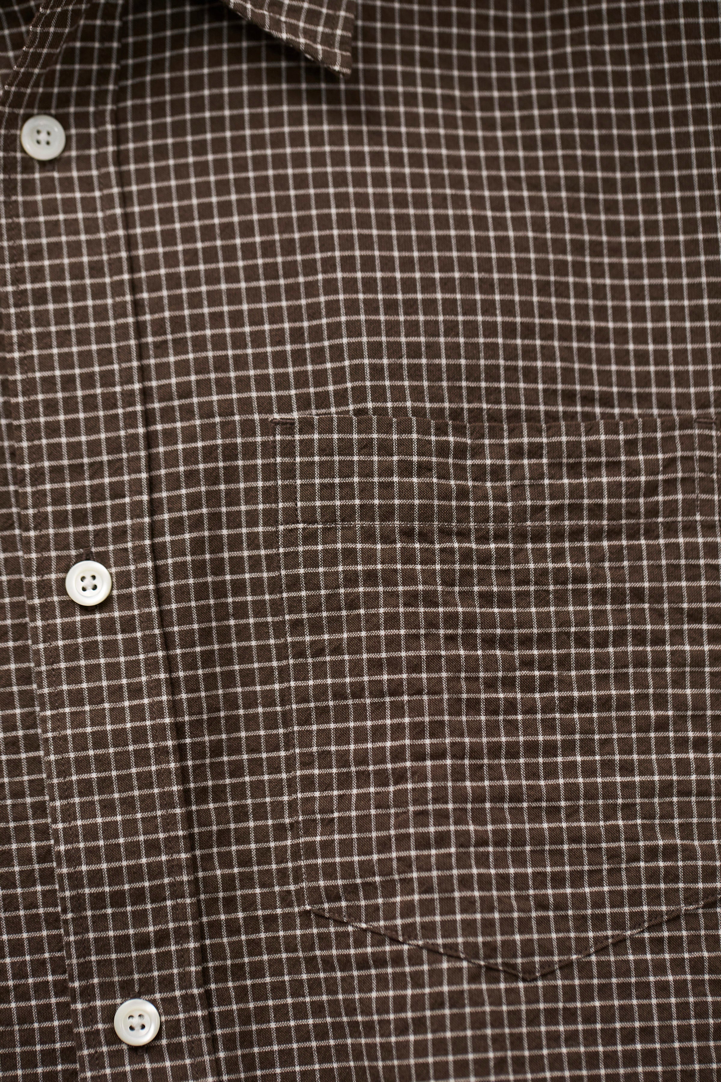 Chemise - Une chemise ajustée, avec un corps plus large, confectionnée en popeline de coton légère, lavée pour un toucher doux et décontracté - Une che…